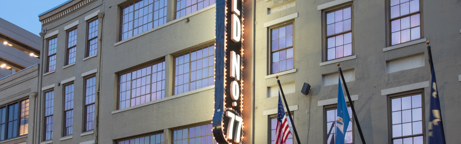 A multi-story building with a vertical 